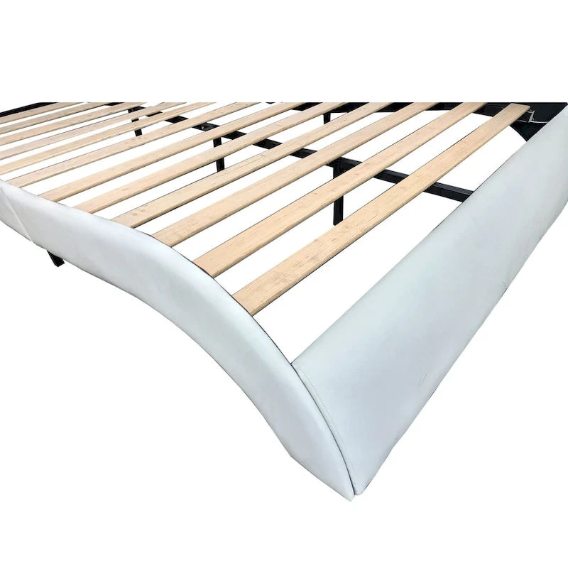 Lit plateforme rembourré en similicuir