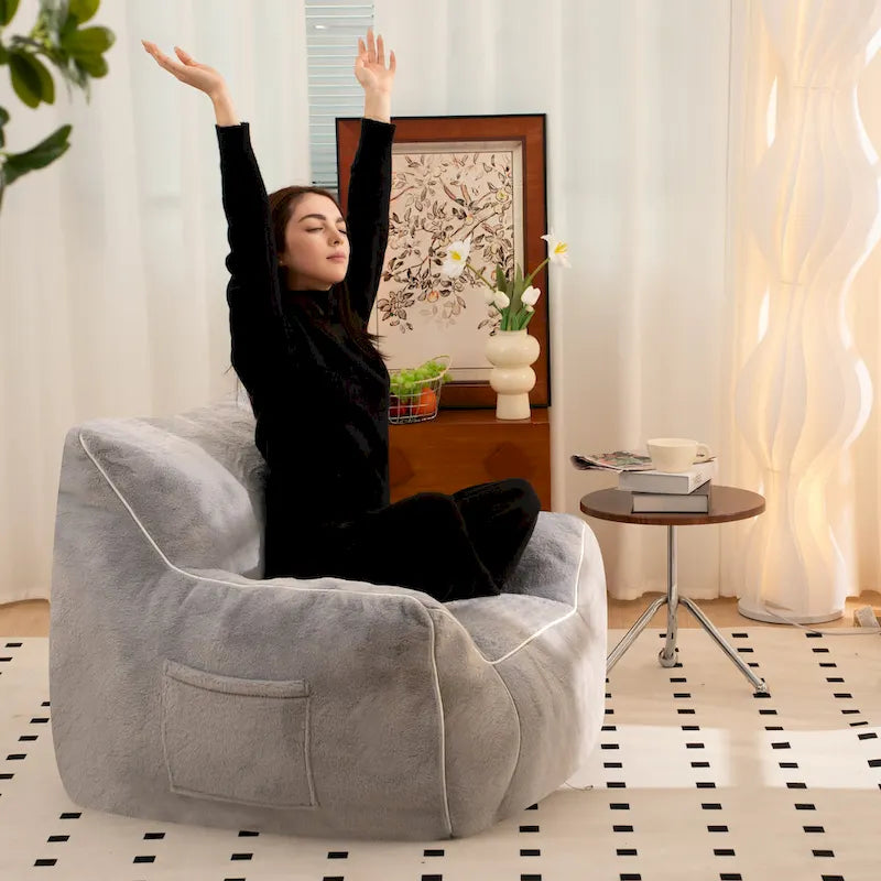 Pouf poire en fausse fourrure avec support dorsal, remplissage en mousse déchiquetée haute densité