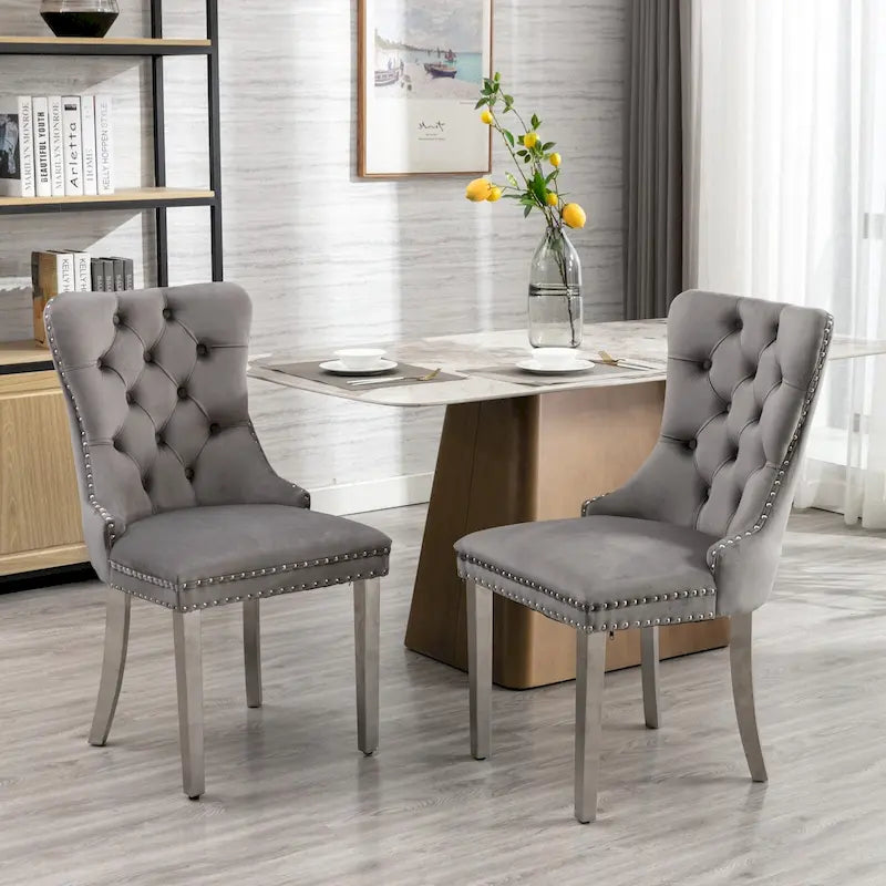 Chaise de salle à manger tapissée de velours avec pieds en acier inoxydable chromé