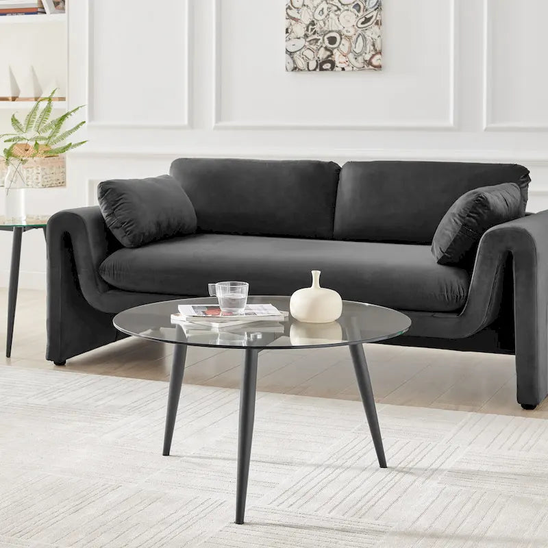 Table basse avec pieds effilés et plateau en verre